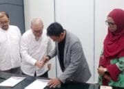 Kesepakatan Kerjasama antara Stikosa AWS dan Fisip Unair