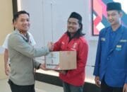 Polres Nganjuk dan Mahasiswa Salurkan 300 Paket Bantuan Sosial Menyambut Ramadhan