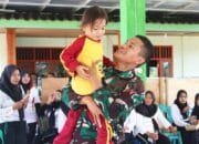 TMMD ke 129 Bojonegoro Bangun Infrastruktur Sekaligus Kebersamaan dengan Anak-anak Kesongo
